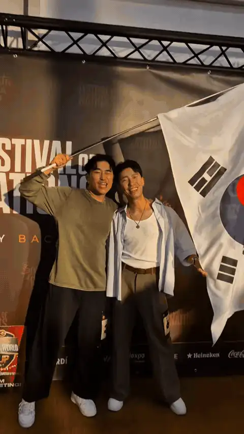 Daewoo and Waffle waving the Korean flag