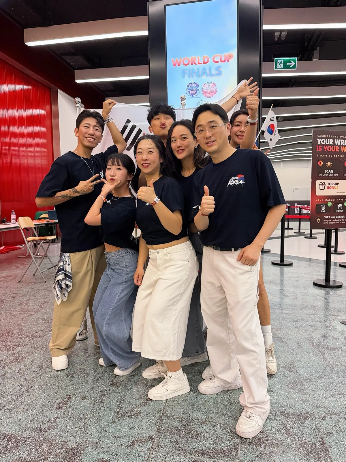 Korean dancers in front of the World Cup Finals screen